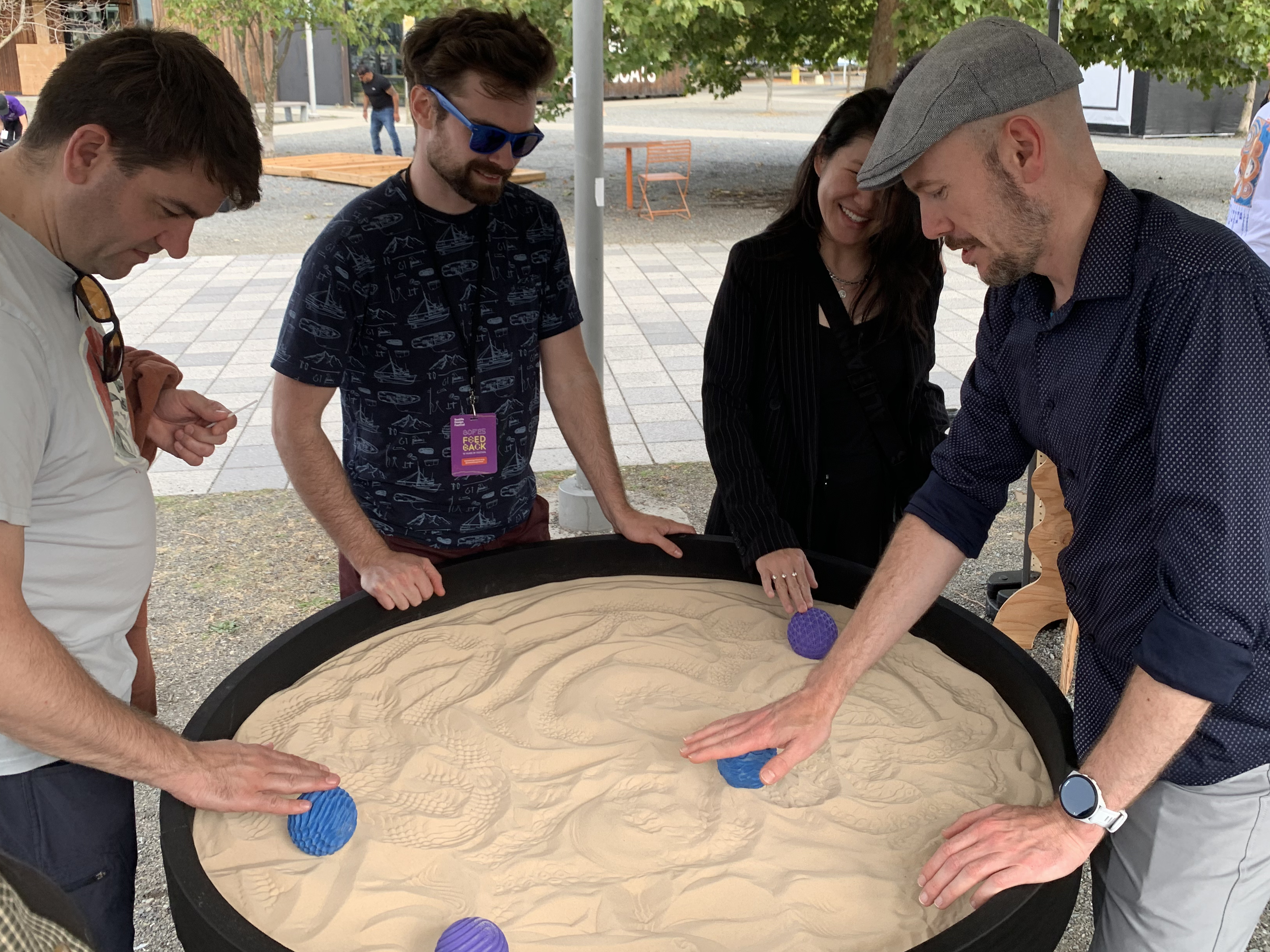 A group playing with the exhibit